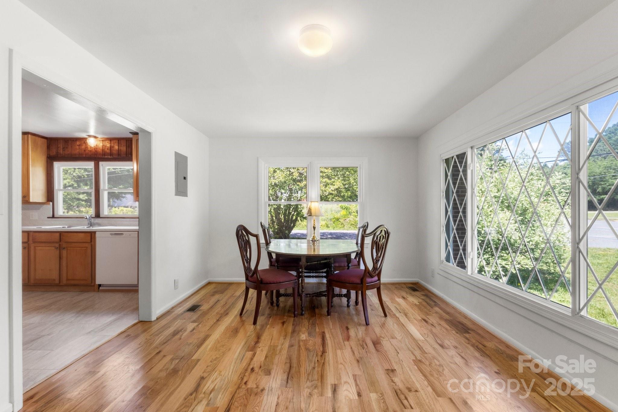 1725 Fallston Road Shelby, NC 28150 - Photo 8 of 35 a view of a dining room with furniture window and wooden floor