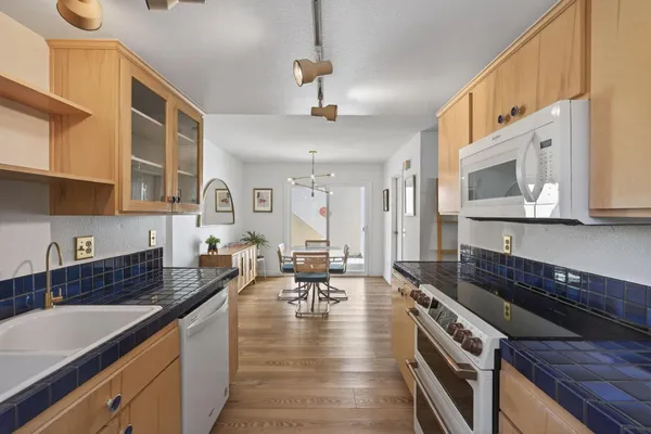 a kitchen with granite countertop lots of counter top space