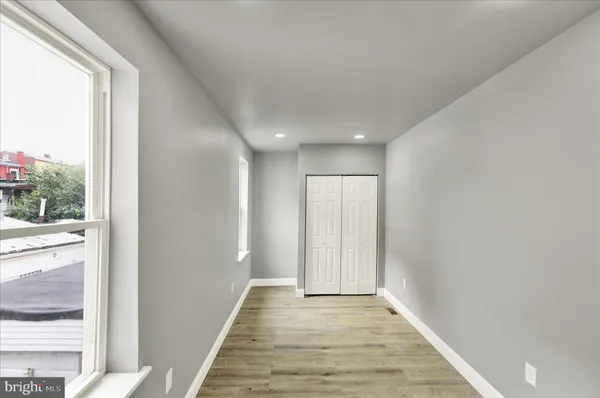 a view of an empty room and window