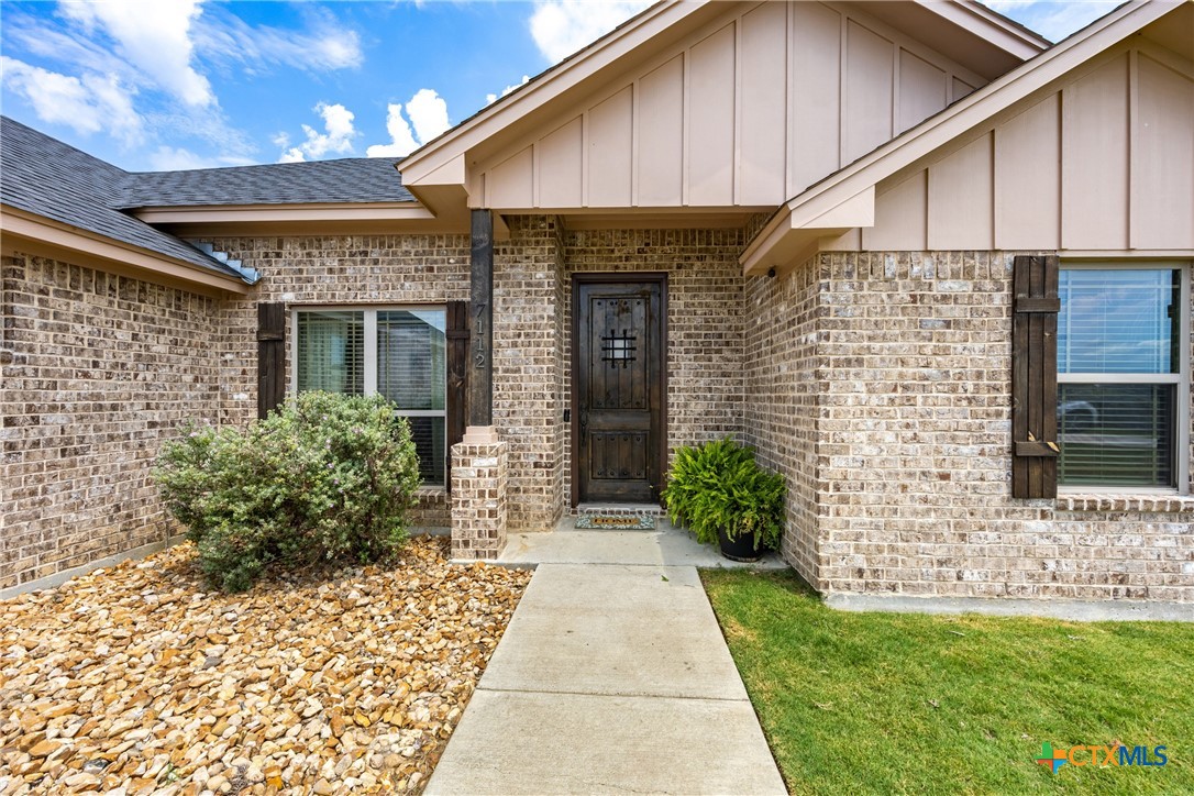 7112 Kc Ranch Court Temple, TX 76501 - Photo 2 of 30 a front view of a house with garden