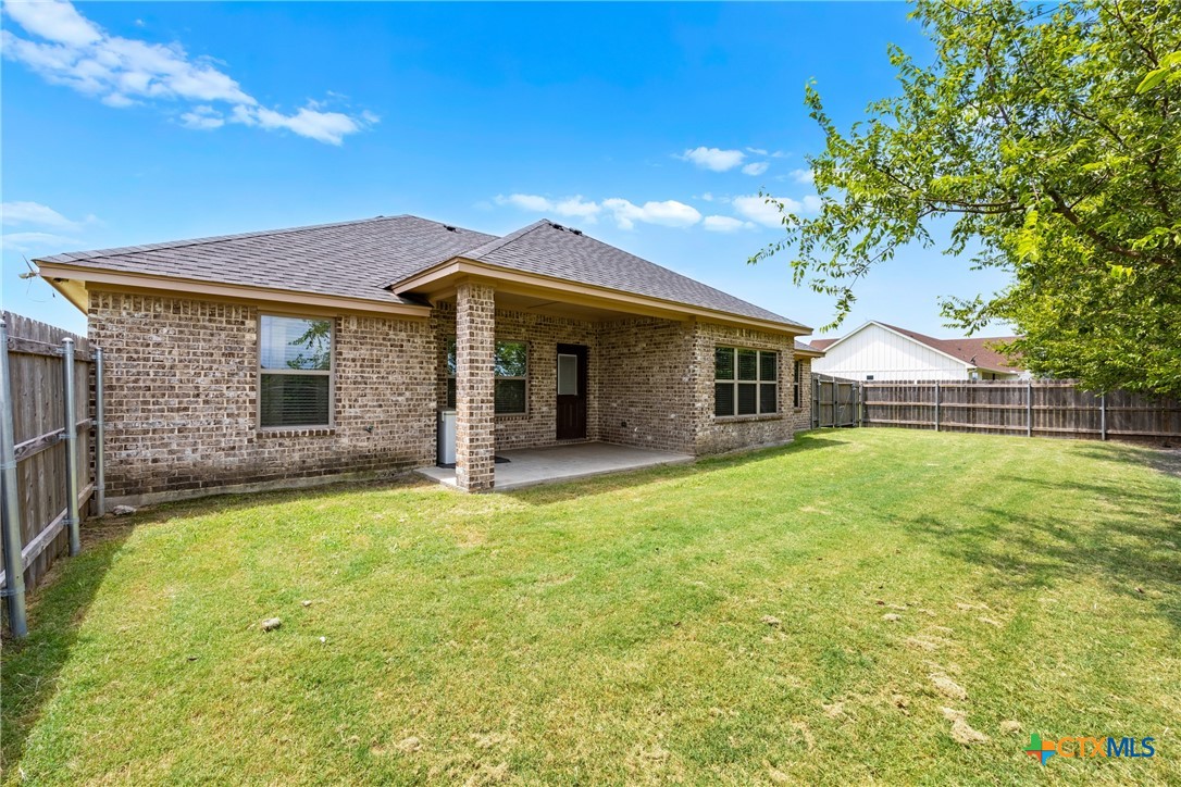 7112 Kc Ranch Court Temple, TX 76501 - Photo 25 of 30 a view of a house with a backyard