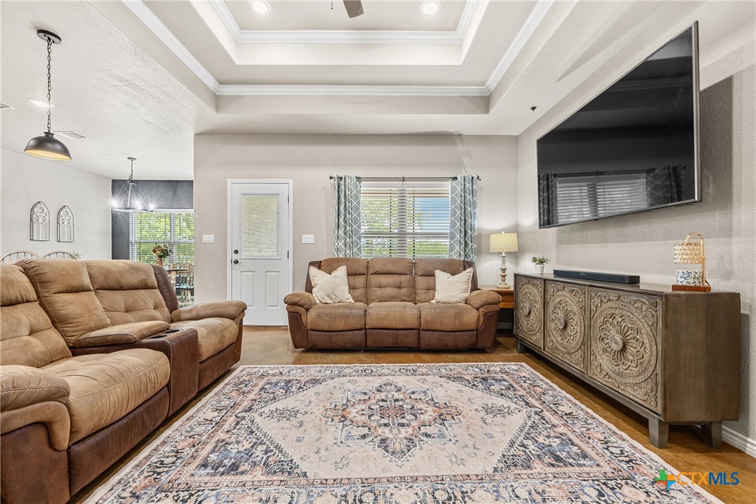 7112 Kc Ranch Court Temple, TX 76501 - Photo 8 of 30 a living room with furniture and a flat screen tv