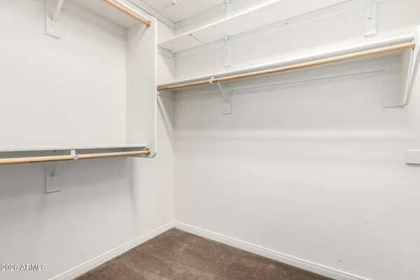 a view of a room with racks on the wall