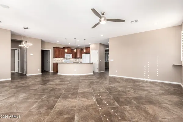 a view of a kitchen with a sink and a window