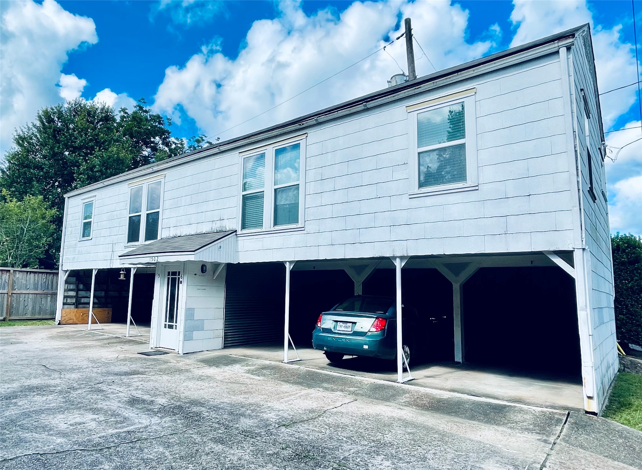 1502 Elmen Street, Unit 4 Houston, TX 77019 - Photo 8 of 9 One designated covered parking spot