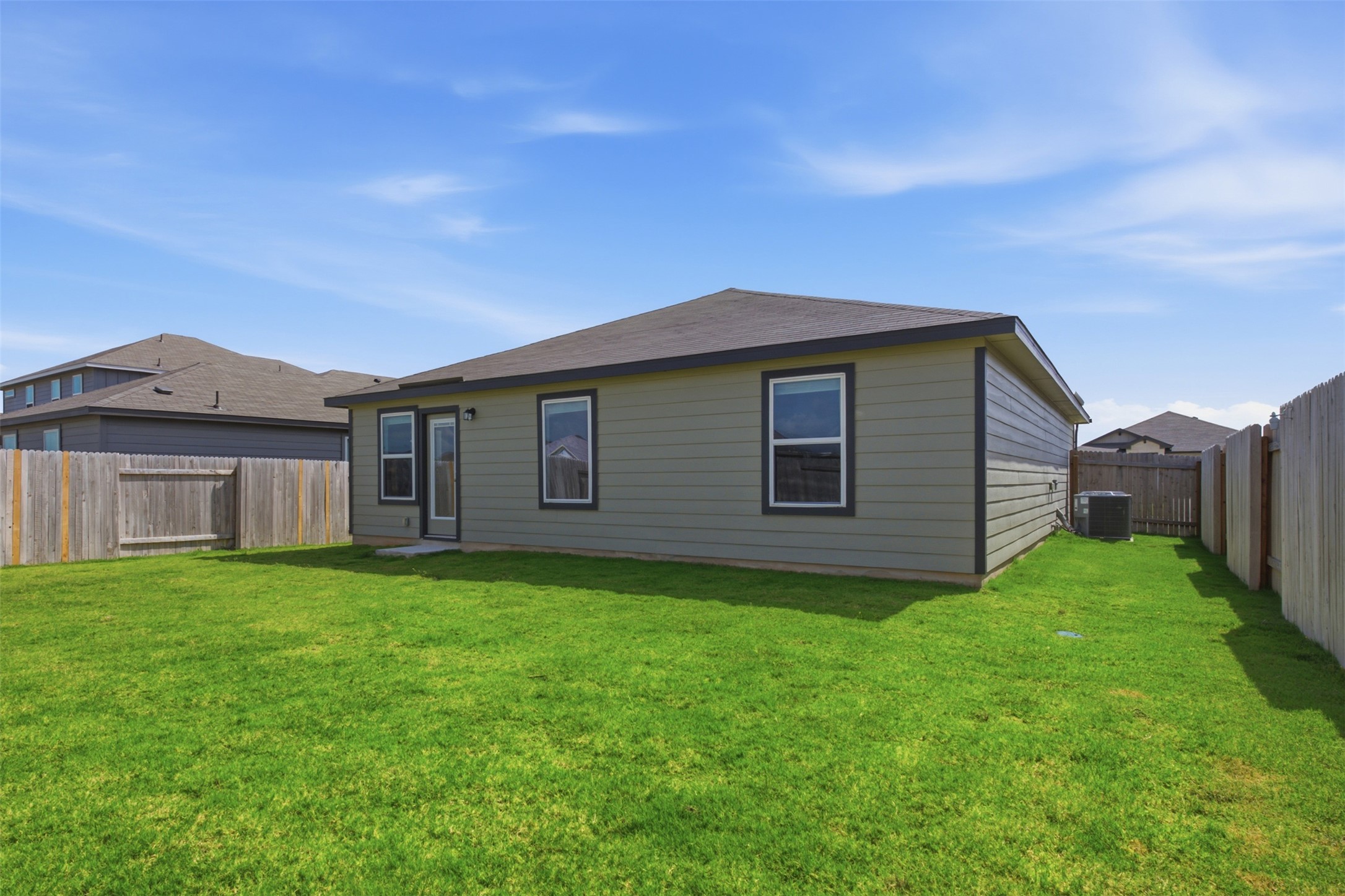 121 Honey Bee Road Jarrell, TX 76537 - Photo 23 of 25 a house view with a garden space