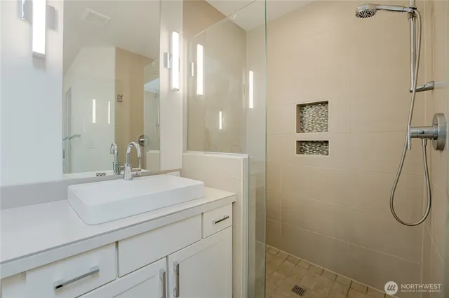 a bathroom with a bathtub and window
