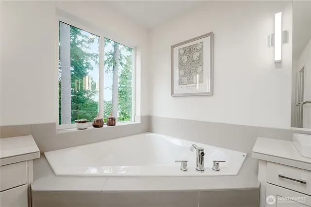 a view of a livingroom with a lounge chair and a window