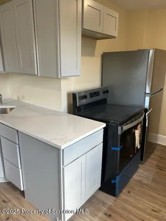 a utility room with washer and dryer
