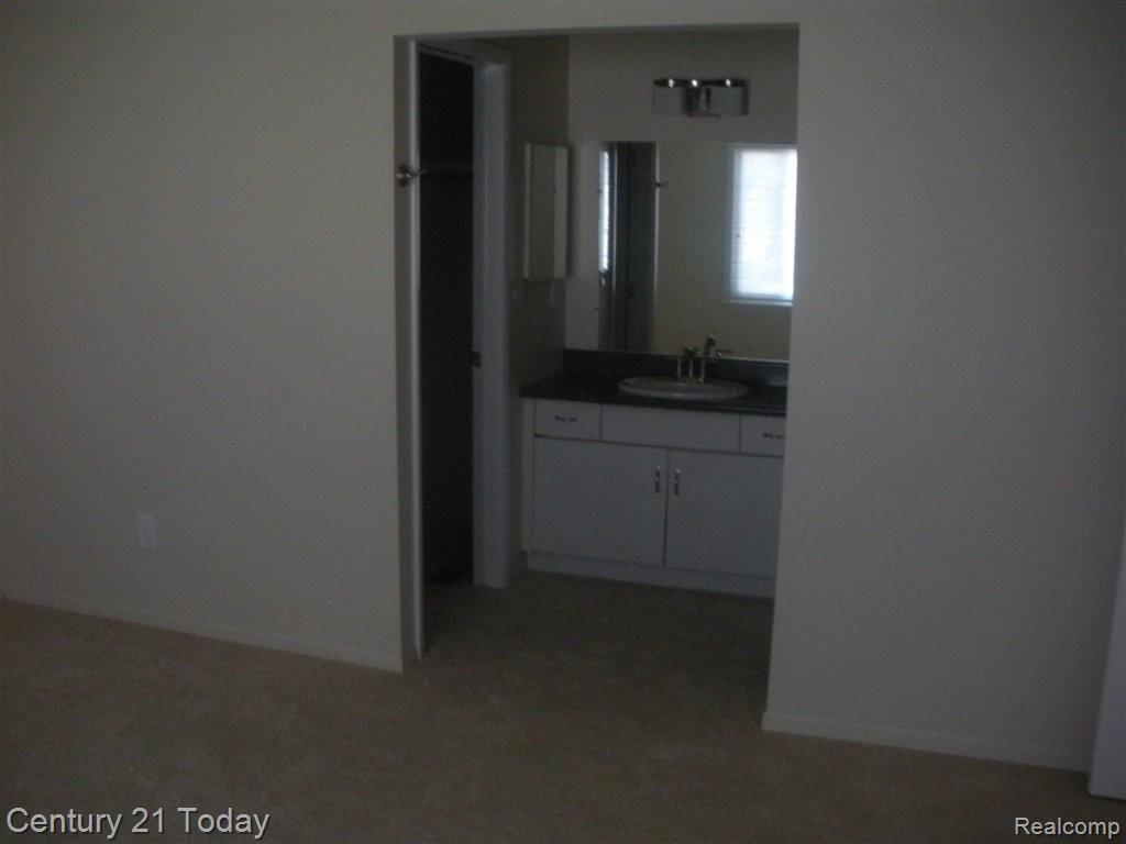 23227 Farmington Road Farmington, MI 48336 - Photo 8 of 18 Master Bath from Master BR.jpg