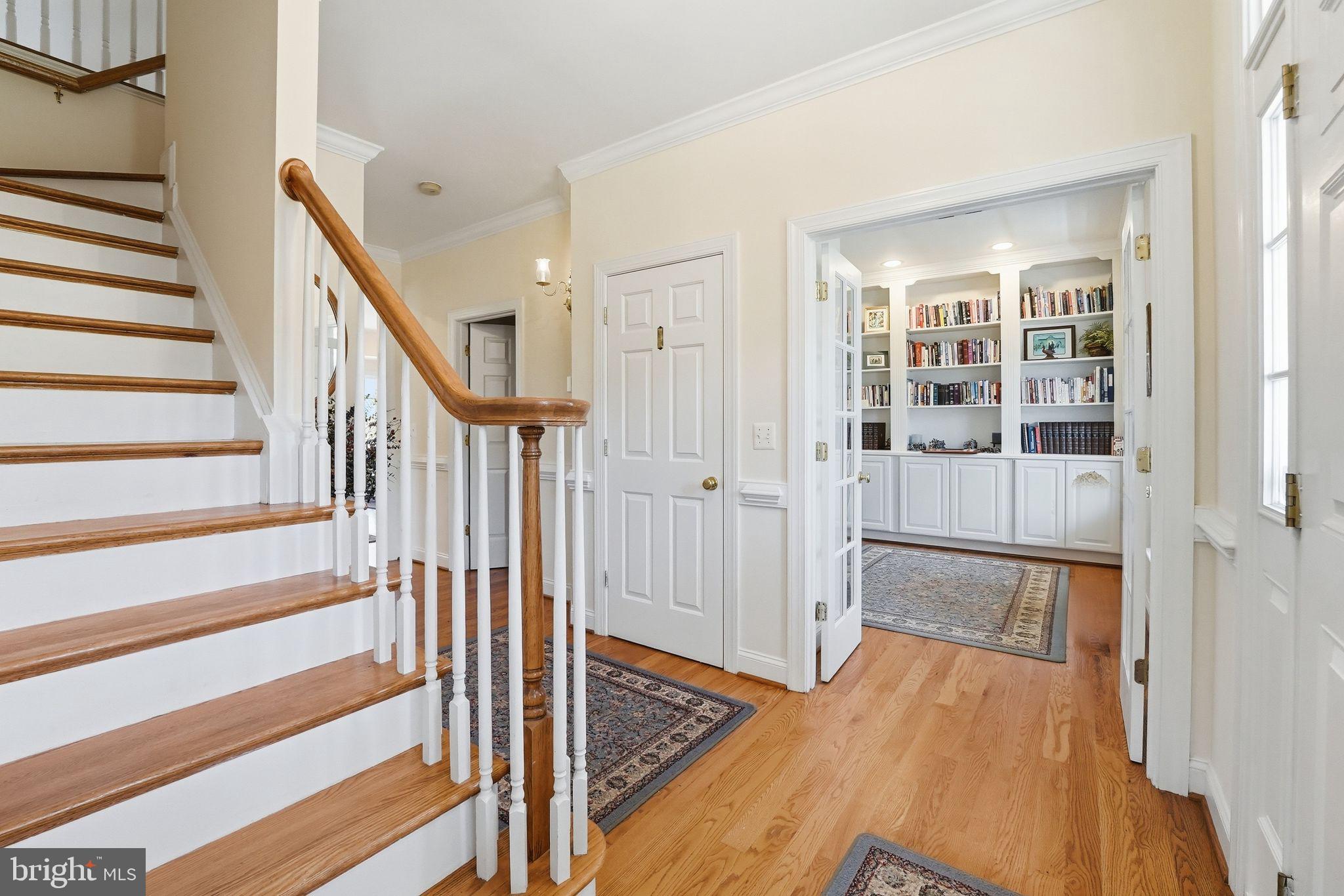 140 Woods Ridge Lane Reva, VA 22735 - Photo 23 of 87 a view of a hallway with wooden floor and staircase