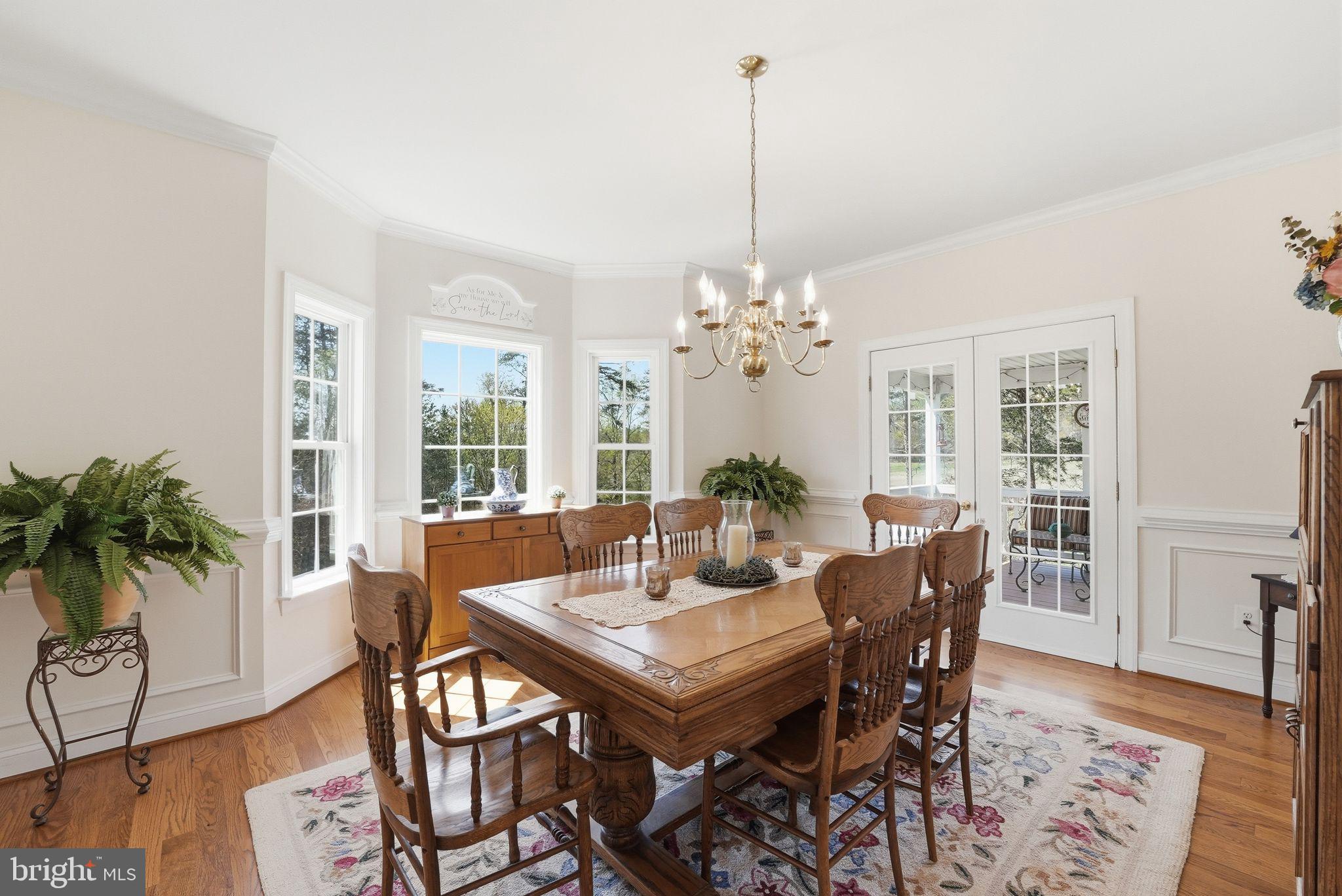 140 Woods Ridge Lane Reva, VA 22735 - Photo 25 of 87 a view of a dining room with furniture window and wooden floor