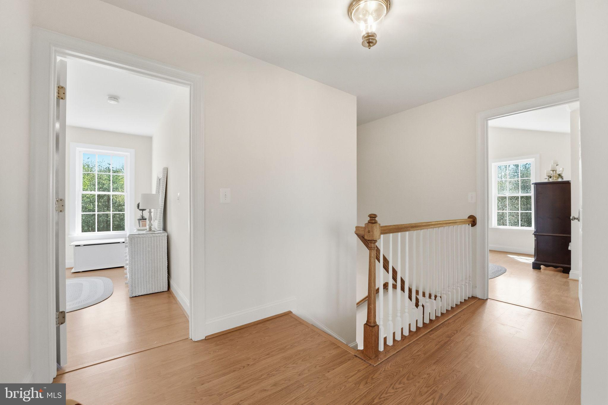 140 Woods Ridge Lane Reva, VA 22735 - Photo 29 of 87 a view of a hallway with wooden floor and dining room
