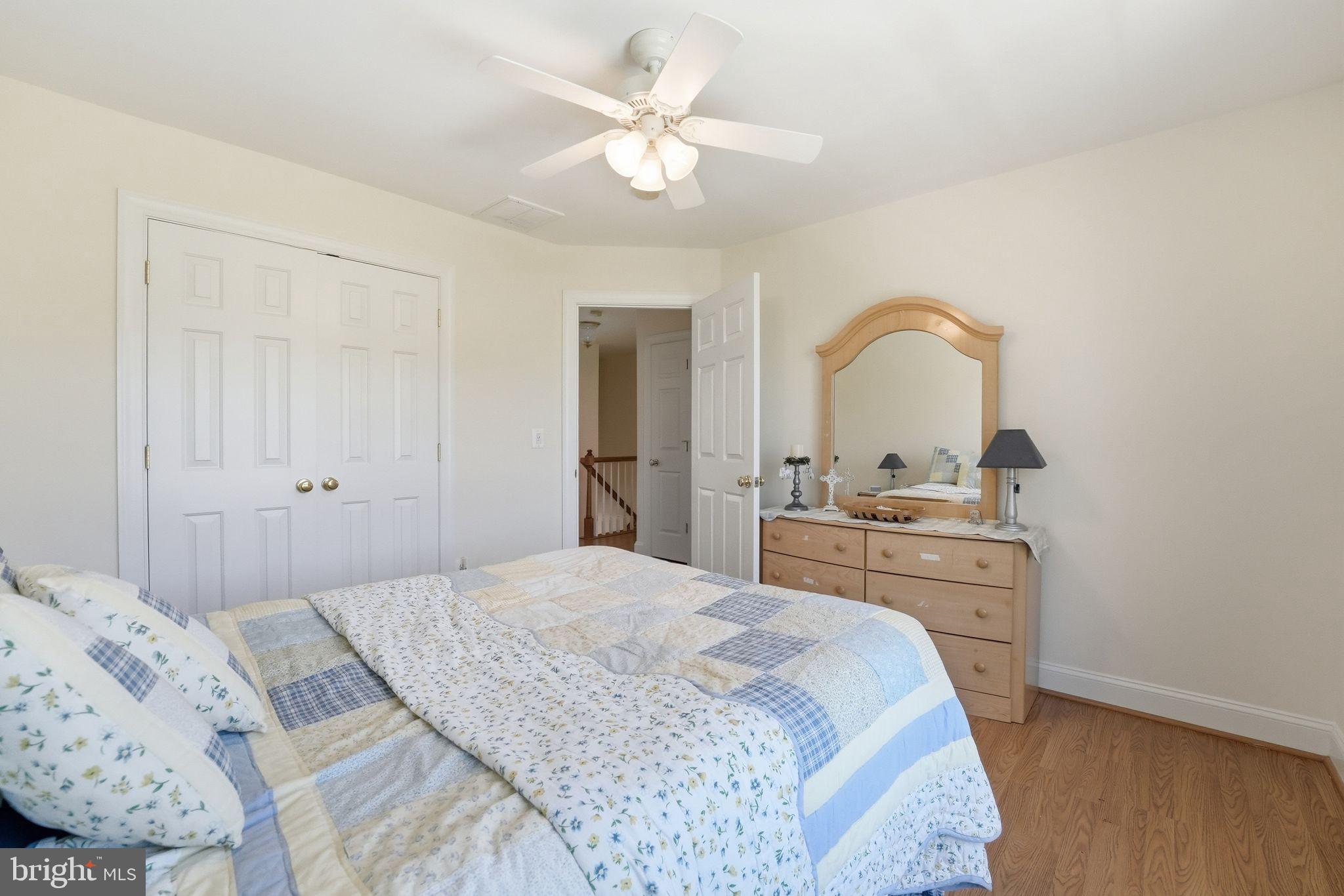 140 Woods Ridge Lane Reva, VA 22735 - Photo 40 of 87 a bedroom with a bed and a dresser