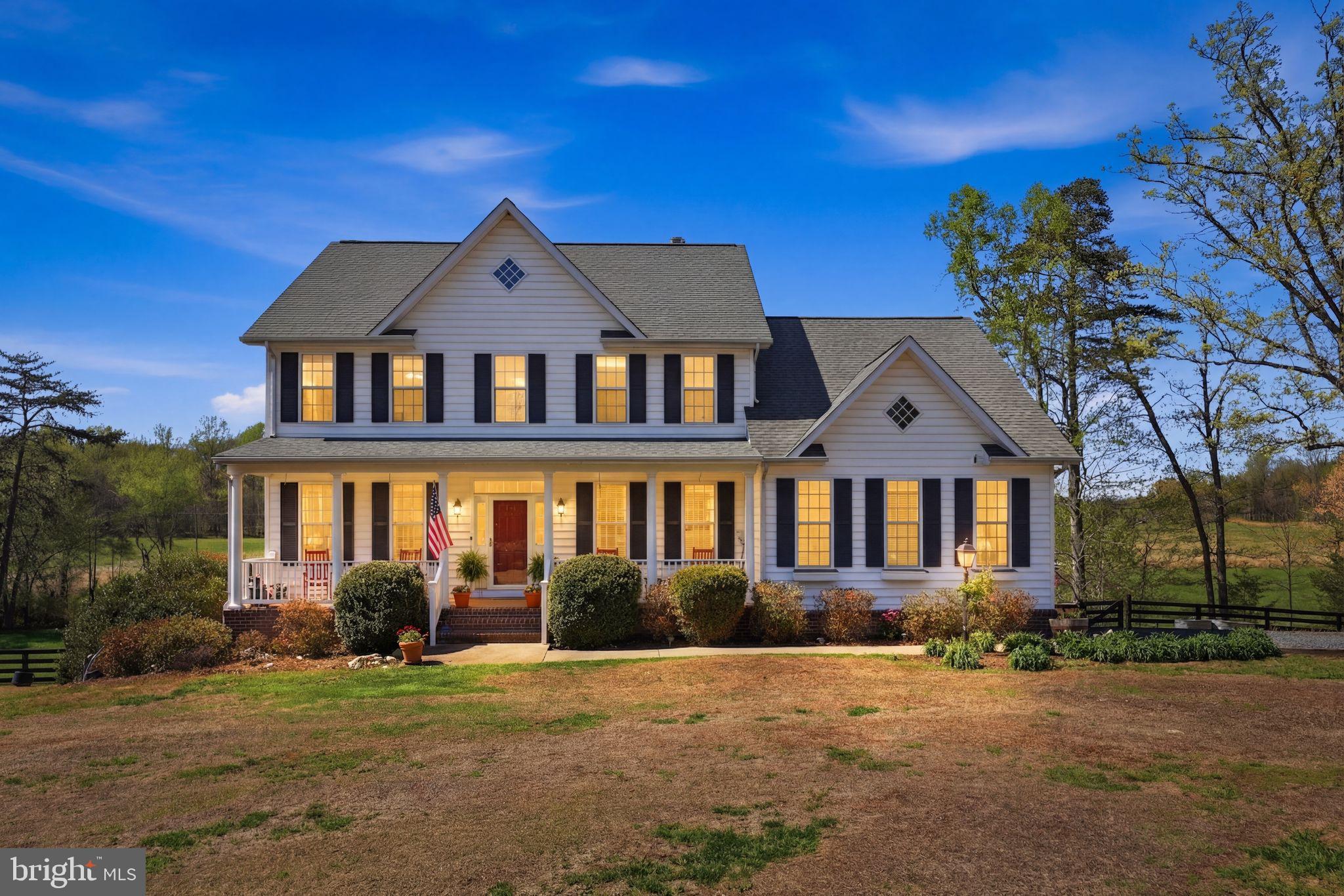 140 Woods Ridge Lane Reva, VA 22735 - Photo 5 of 87 a front view of a house with garden