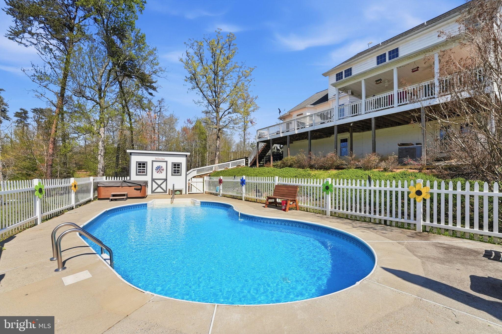 140 Woods Ridge Lane Reva, VA 22735 - Photo 65 of 87 a view of a house with swimming pool and porch