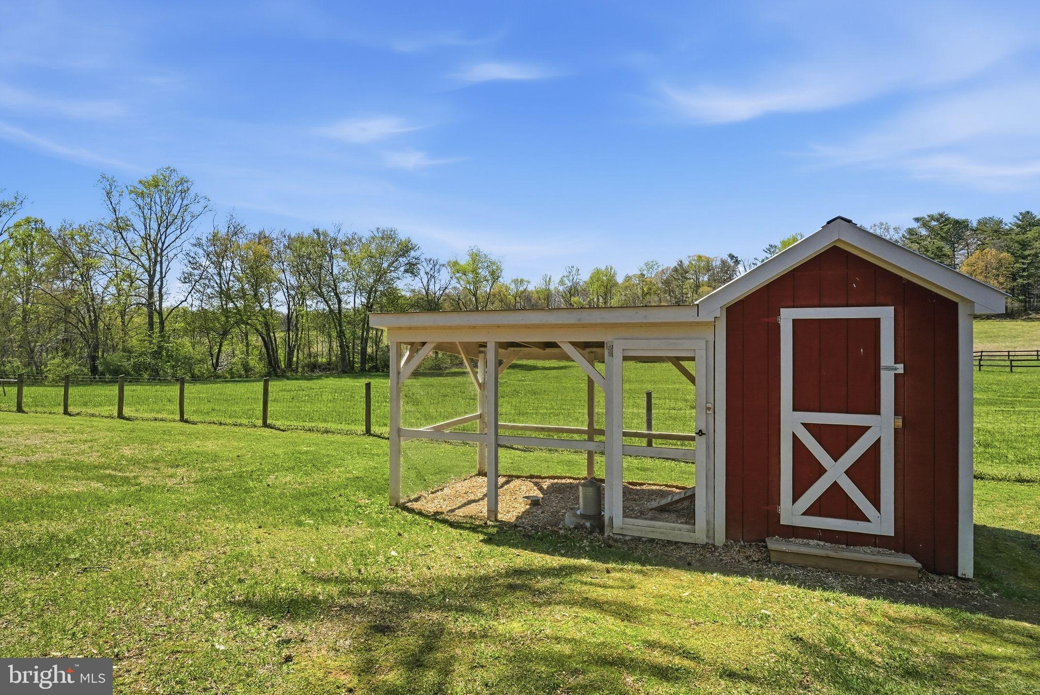 140 Woods Ridge Lane Reva, VA 22735 - Photo 67 of 87 a view of a backyard with a garden and entertaining space