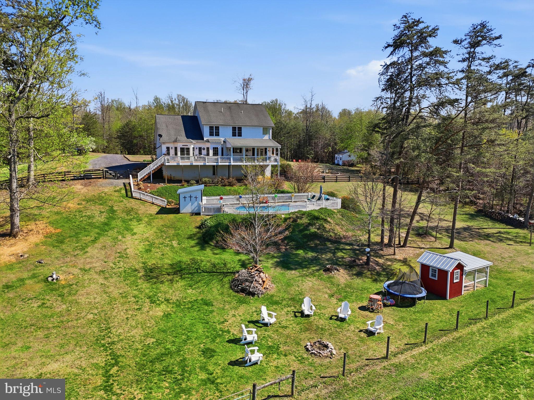 140 Woods Ridge Lane Reva, VA 22735 - Photo 68 of 87 a view of a house with a yard and sitting area