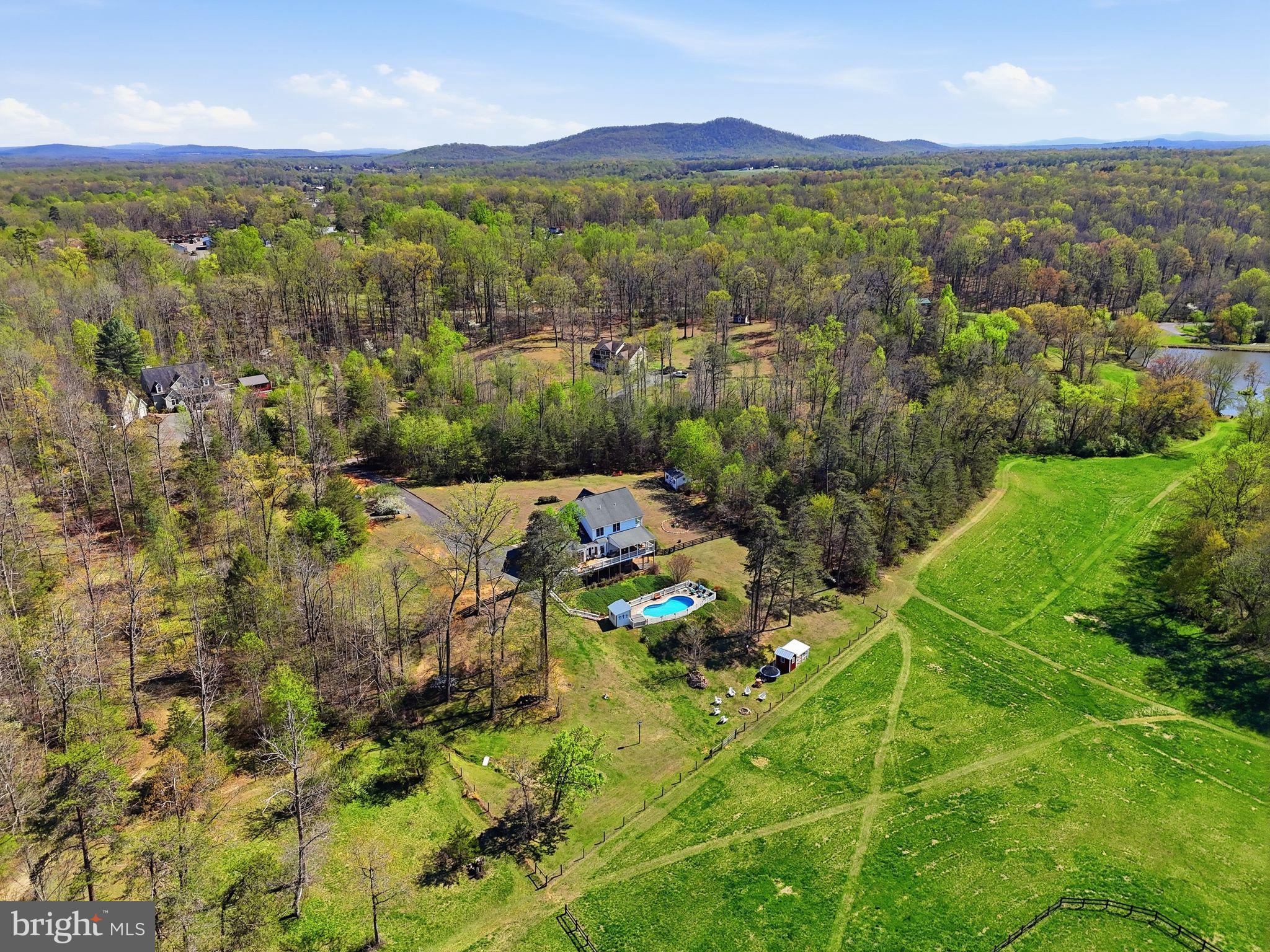 140 Woods Ridge Lane Reva, VA 22735 - Photo 78 of 87 a view of a garden with mountains in the background