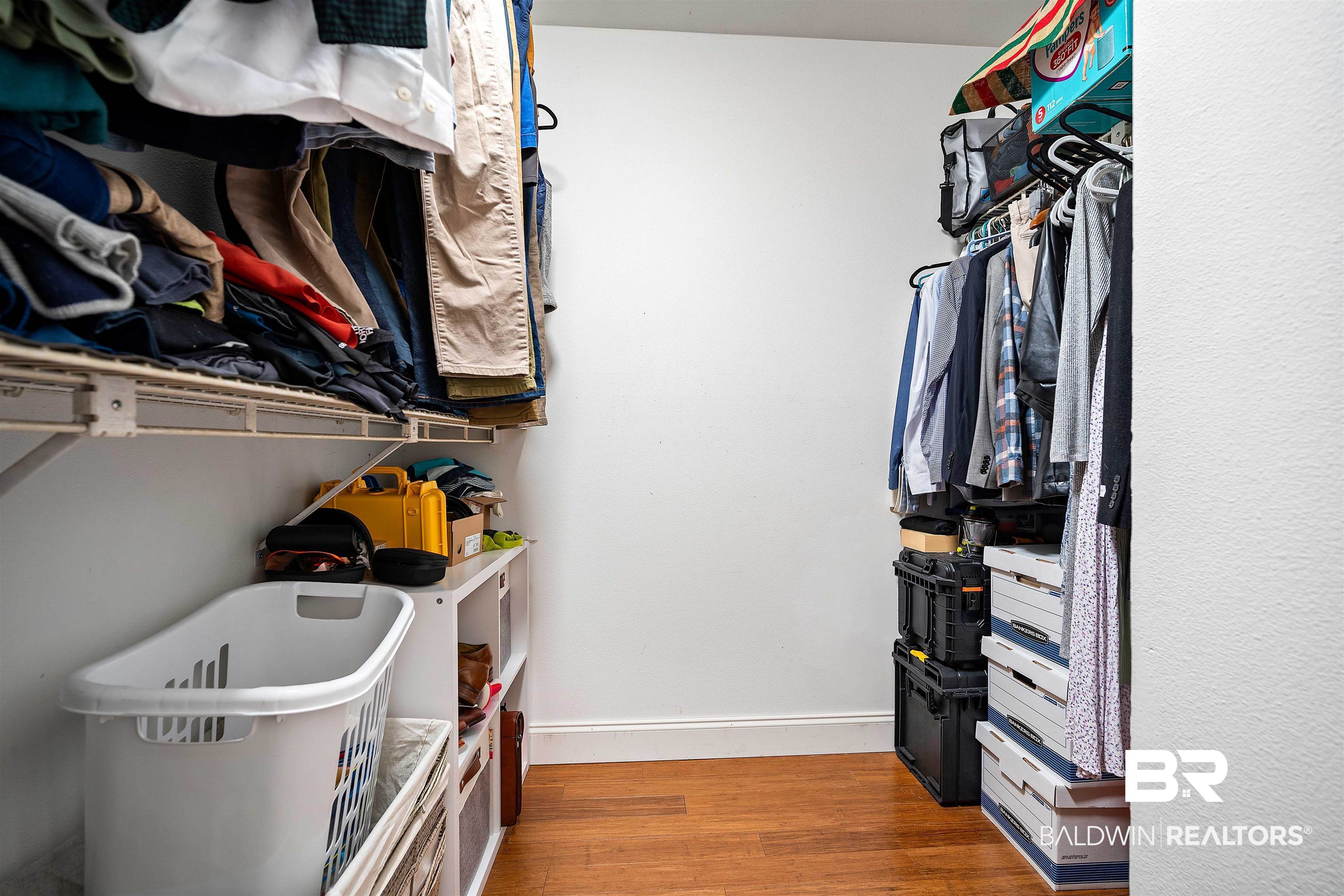808 Michigan Avenue Fairhope, AL 36532 - Photo 19 of 33 Walk in closet featuring wood-type flooring