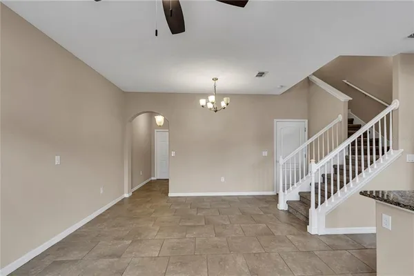 a view of a livingroom with a staircase