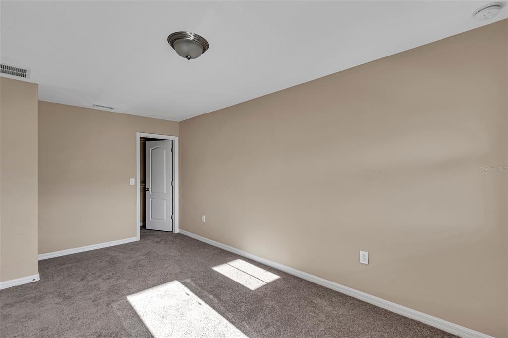 106 Carmichael Way Daytona Beach, FL 32124 - Photo 13 of 35 a view of an empty room
