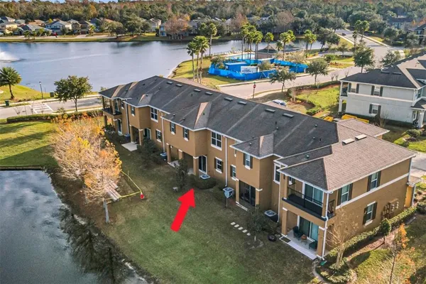 a view of a lake with a house