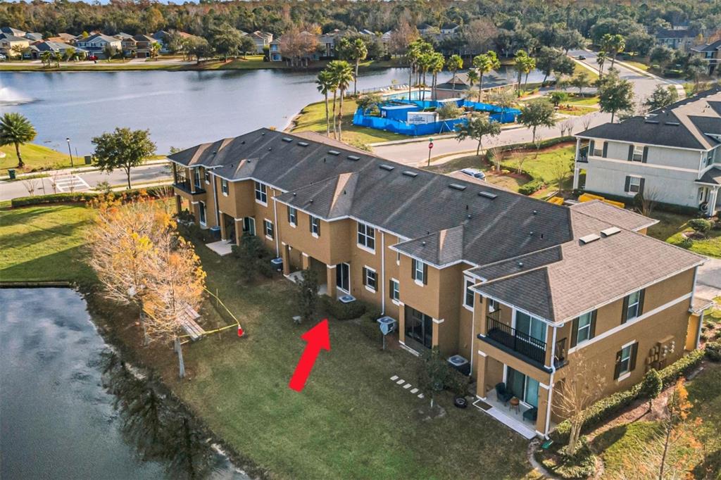 106 Carmichael Way Daytona Beach, FL 32124 - Photo 26 of 35 a view of a lake with a house