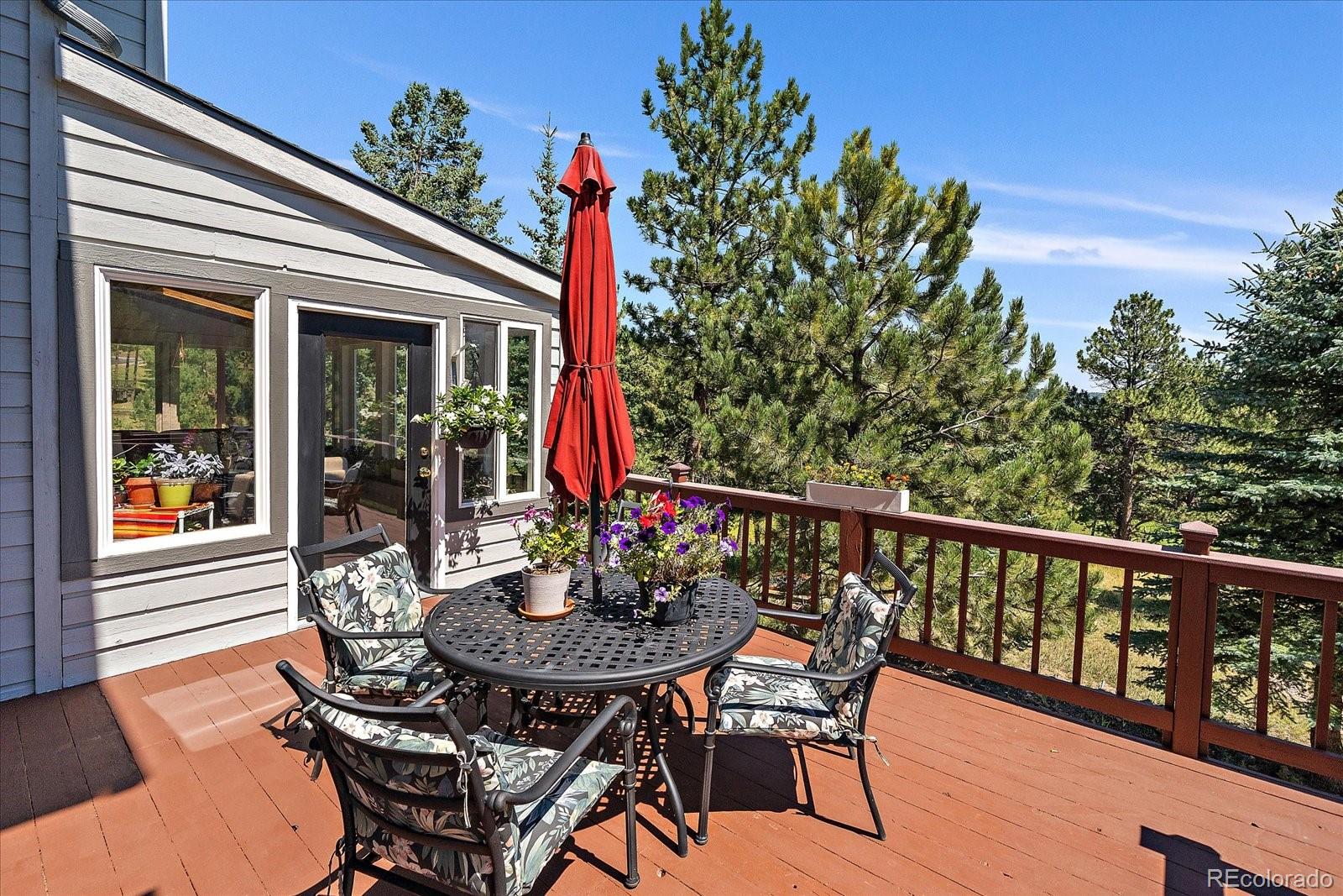 31518 Niakwa Road Evergreen, CO 80439 - Photo 13 of 48 a view of a outdoor seating