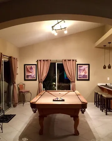 a room with table and chairs