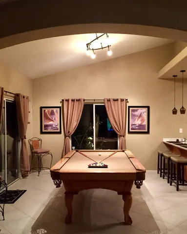 a room with table and chairs