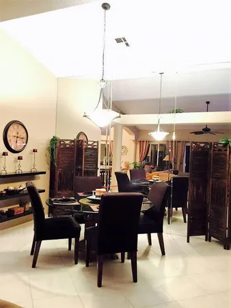 a view of a dining room with furniture