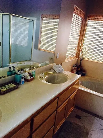 a bathroom with a sink and a bathtub