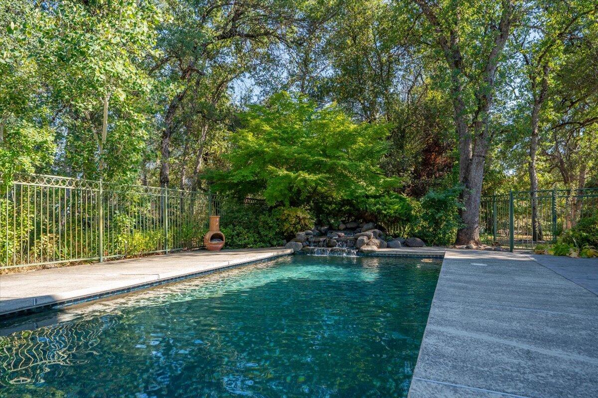 15745 Montgomery Ranch Road Redding, CA 96001 - Photo 22 of 33 a view of a park with large trees