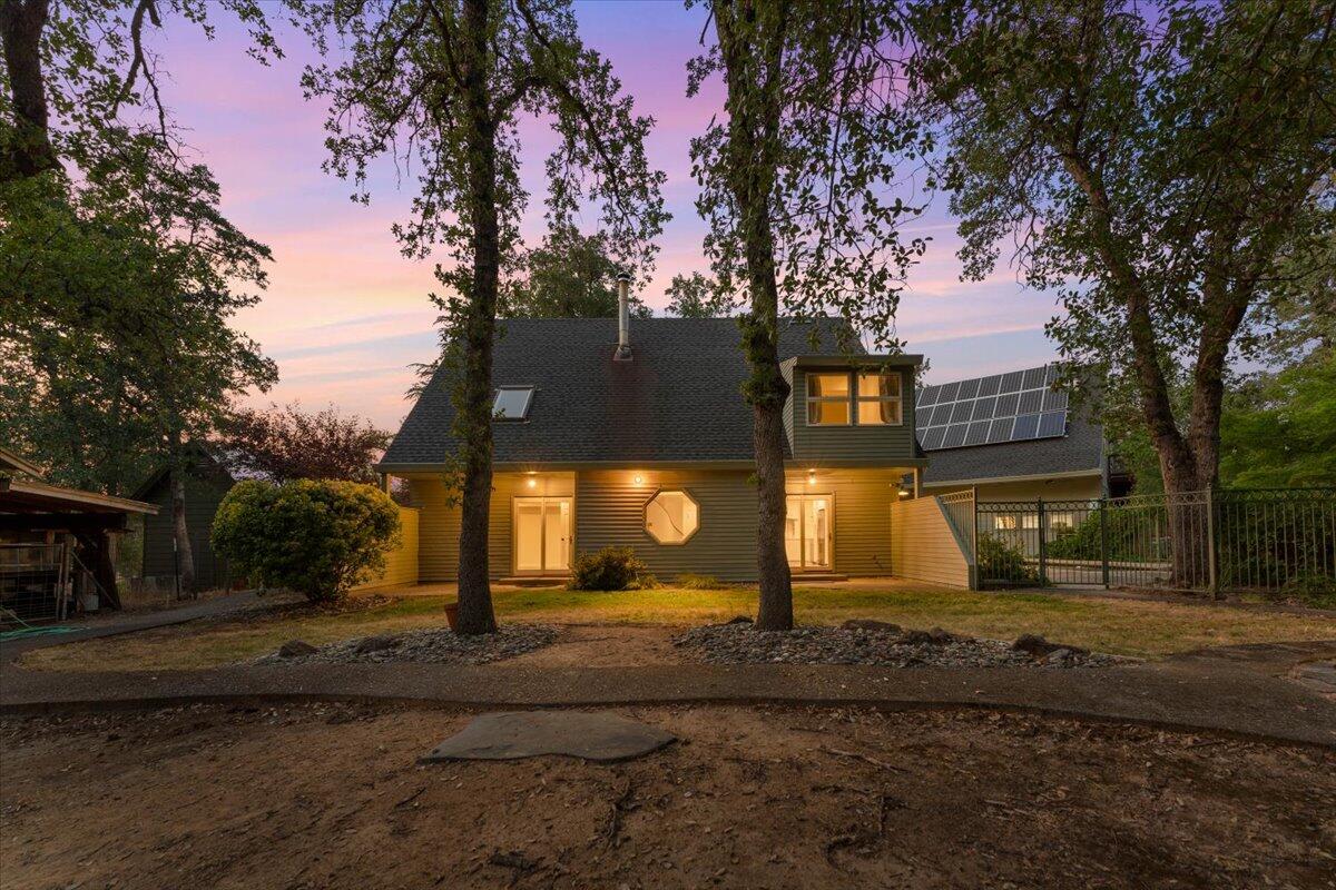 15745 Montgomery Ranch Road Redding, CA 96001 - Photo 23 of 33 a front view of a house with a yard