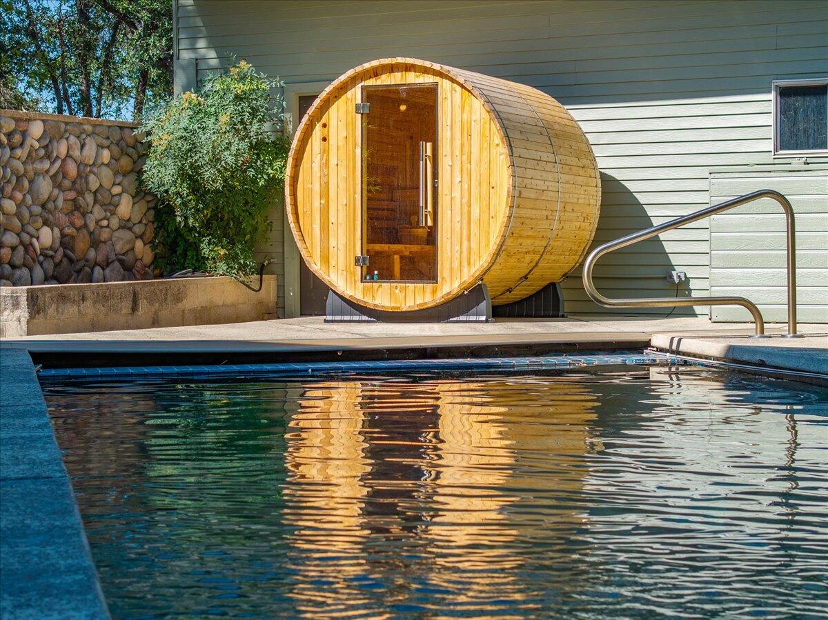 15745 Montgomery Ranch Road Redding, CA 96001 - Photo 25 of 33 a view of swimming pool with an outdoor space