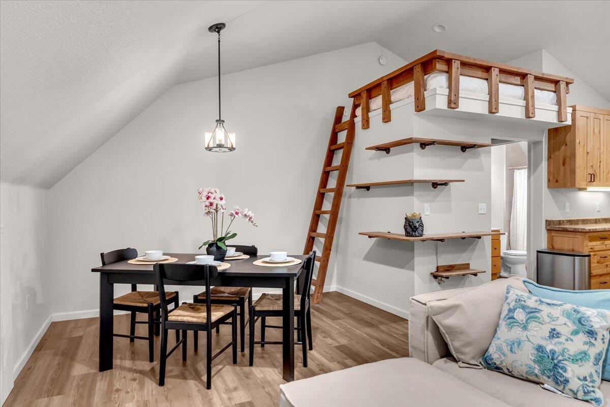 15745 Montgomery Ranch Road Redding, CA 96001 - Photo 28 of 33 a view of a livingroom with furniture and wooden floor