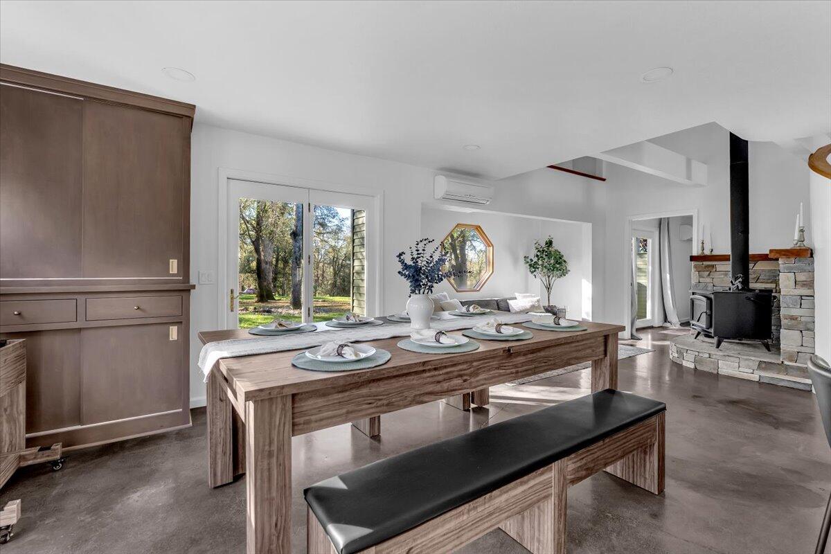 15745 Montgomery Ranch Road Redding, CA 96001 - Photo 10 of 33 a view of a dining room with furniture window and outside view
