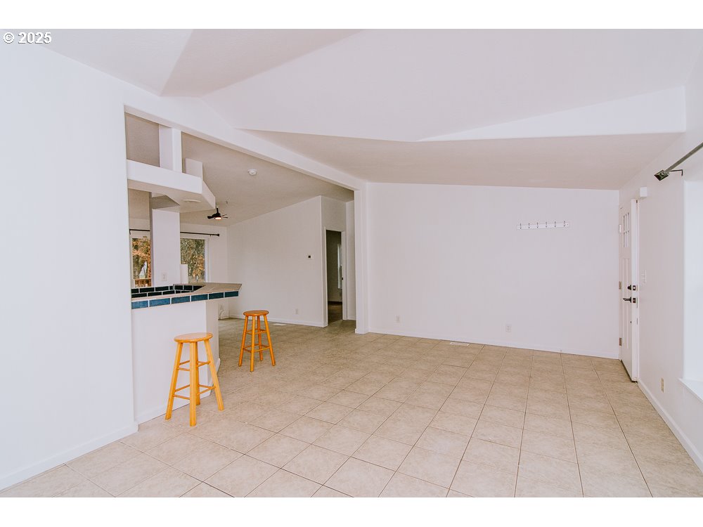 88247 Ellmaker Road Veneta, OR 97487 - Photo 19 of 47 a view of an empty room with stairs