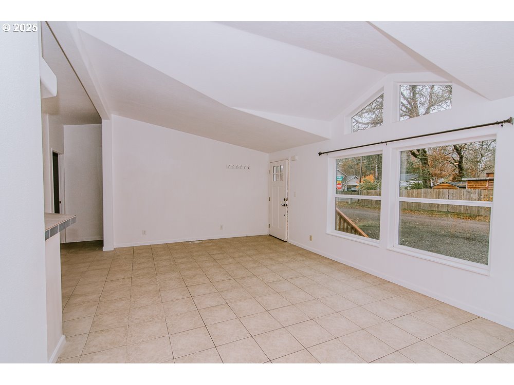 88247 Ellmaker Road Veneta, OR 97487 - Photo 21 of 47 a view of an empty room with a window