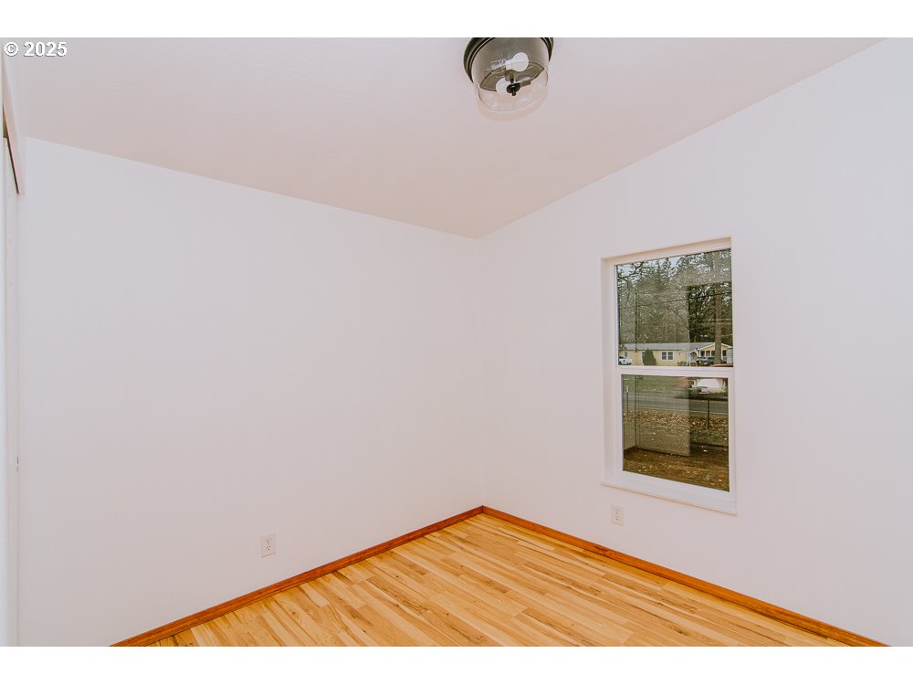 88247 Ellmaker Road Veneta, OR 97487 - Photo 37 of 47 a view of an empty room with a window