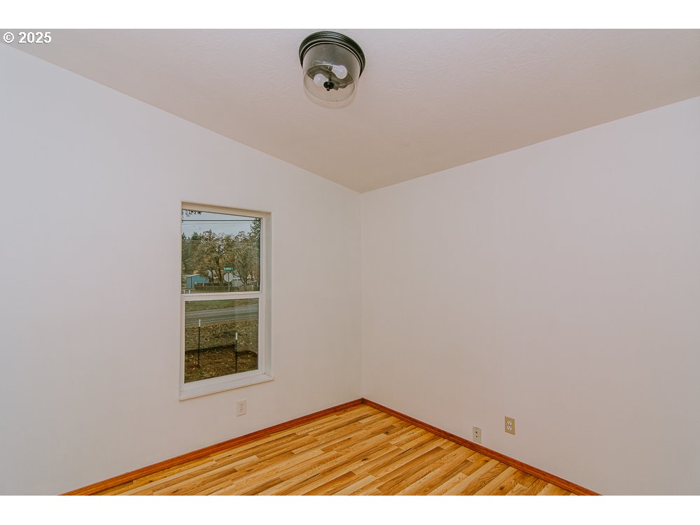 88247 Ellmaker Road Veneta, OR 97487 - Photo 41 of 47 a view of an empty room with a window