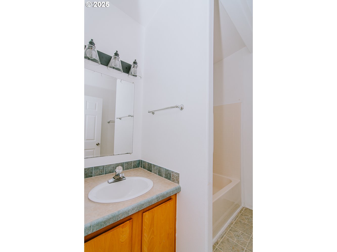 88247 Ellmaker Road Veneta, OR 97487 - Photo 45 of 47 a bathroom with a sink and a mirror