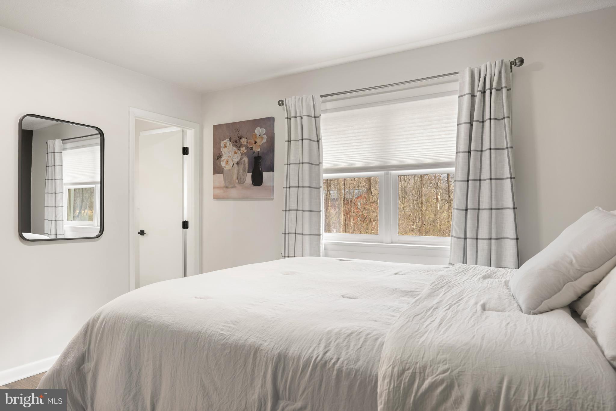 158 Juniata Division Road Lewistown, PA 17044 - Photo 29 of 70 a bedroom with a large bed and a window