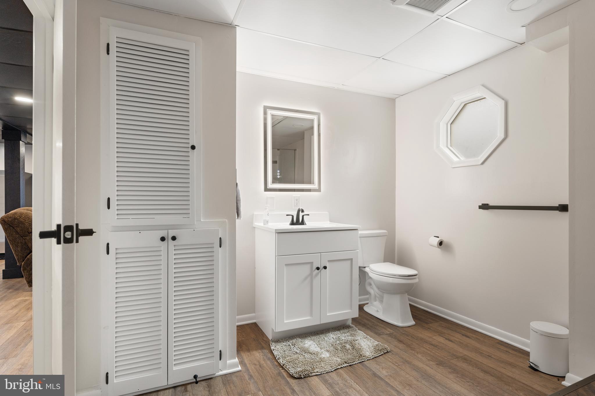 158 Juniata Division Road Lewistown, PA 17044 - Photo 44 of 70 a bathroom with a toilet a sink and mirror