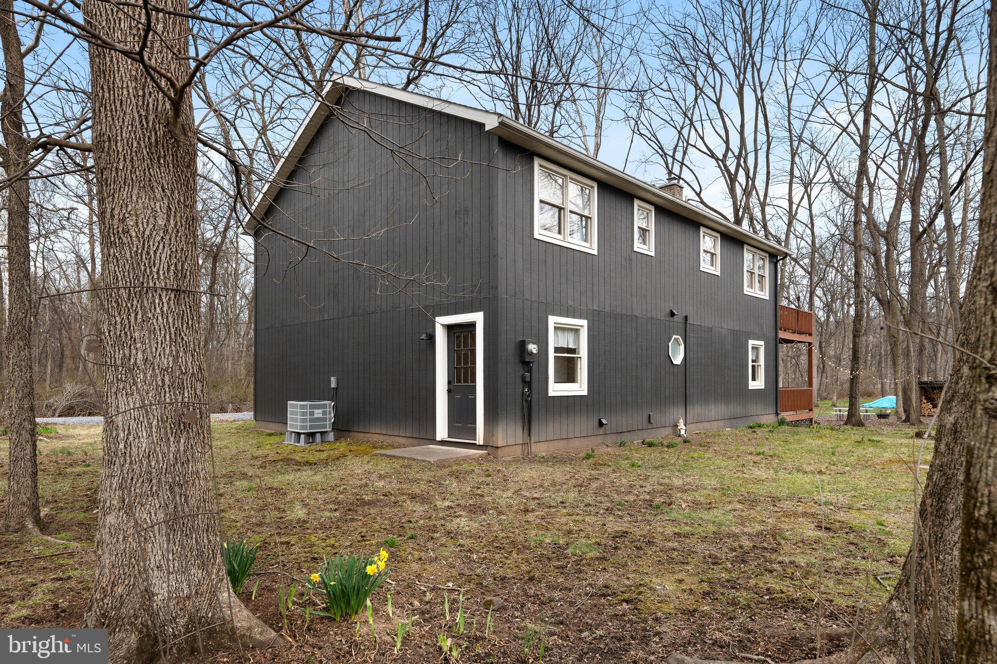 158 Juniata Division Road Lewistown, PA 17044 - Photo 65 of 70 a backyard of a house with oven and a tree