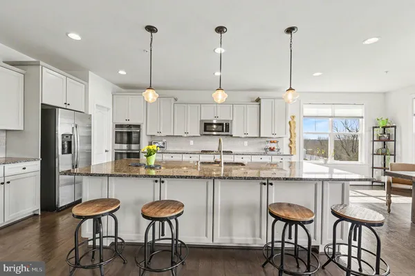 a work room with furniture and windows