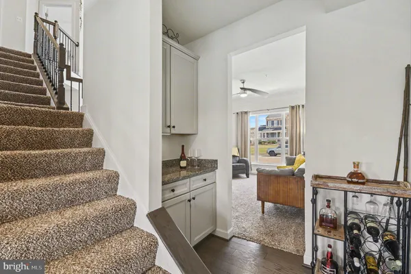 a spacious bedroom with a bed and a window