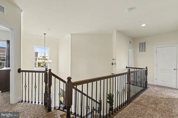a bedroom with a bed and cabinets