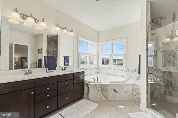 a view of a patio with couches chairs and a yard